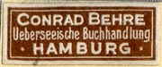 Conrad Behre, Ueberseeische Buchhandlung, Hamburg, Germany (29mm x 12mm, ca.1926). Courtesy of R. Behra.