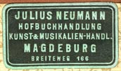 Julius Neumann, Hofbuchhandlung, Kunst-& Musikalien-handlung, Magdeburg, Germany (28mm x 16mm, early 20th c.)