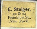 E. Steiger, New York, NY (19mm x 15mm). Courtesy of Robert Behra.